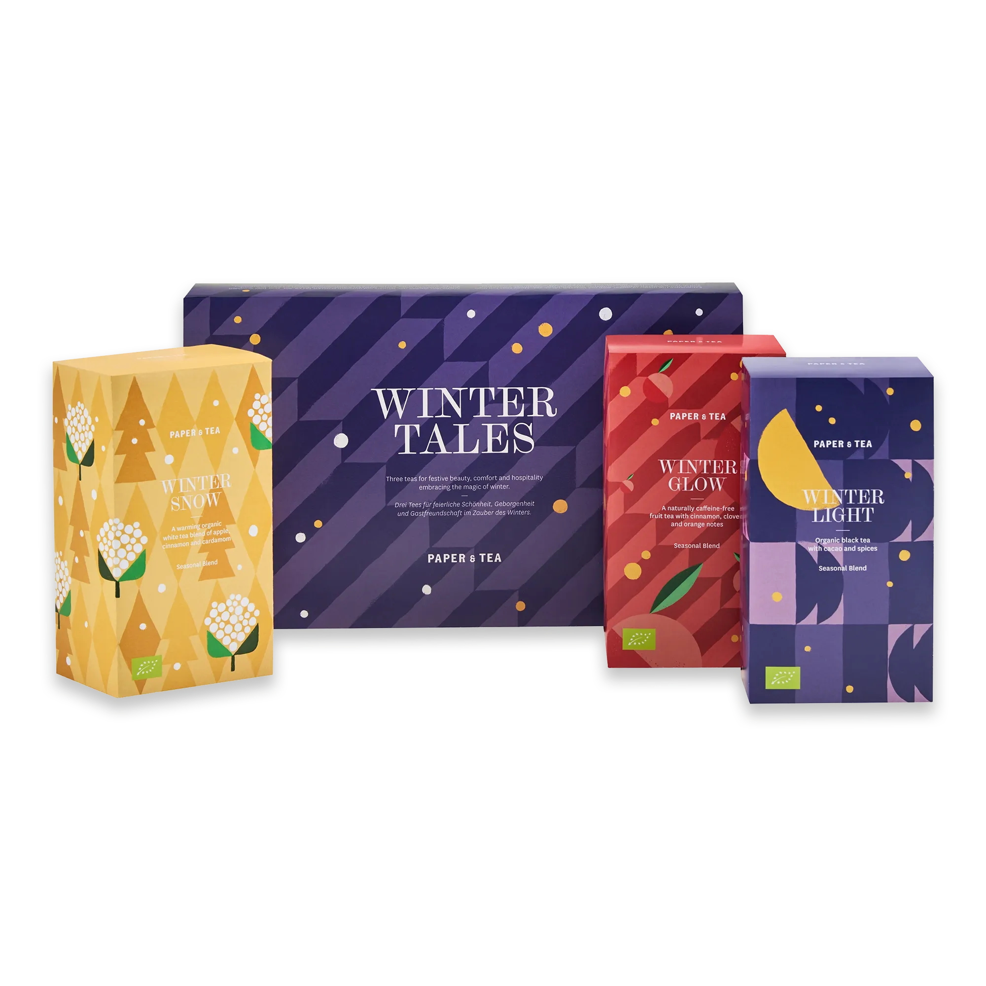Vier festliche Teeboxen der PAPER & TEA Winter Tales Kollektion mit Bio-Zutaten wie Apfel und Zimt.